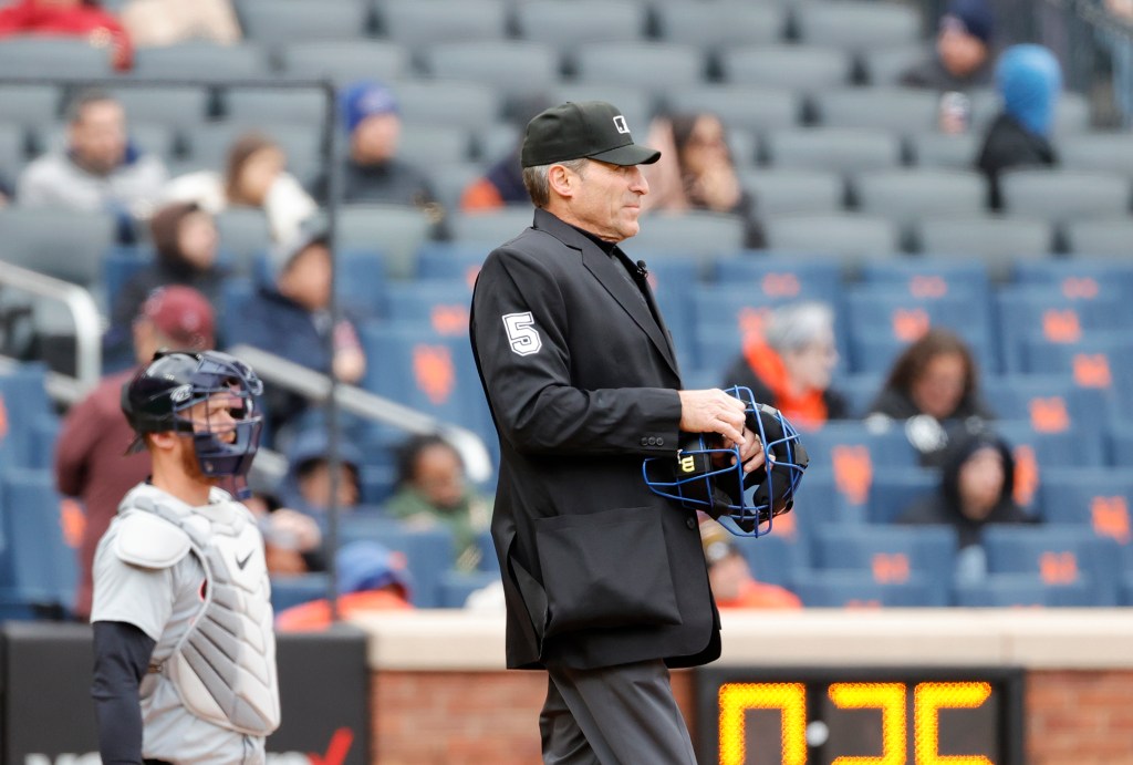 Umpire Angel Hernandez at home plate in the fifth inning of game one of a double header at Citi Field in Queens, New York, USA, Thursday, April 04, 2024. 