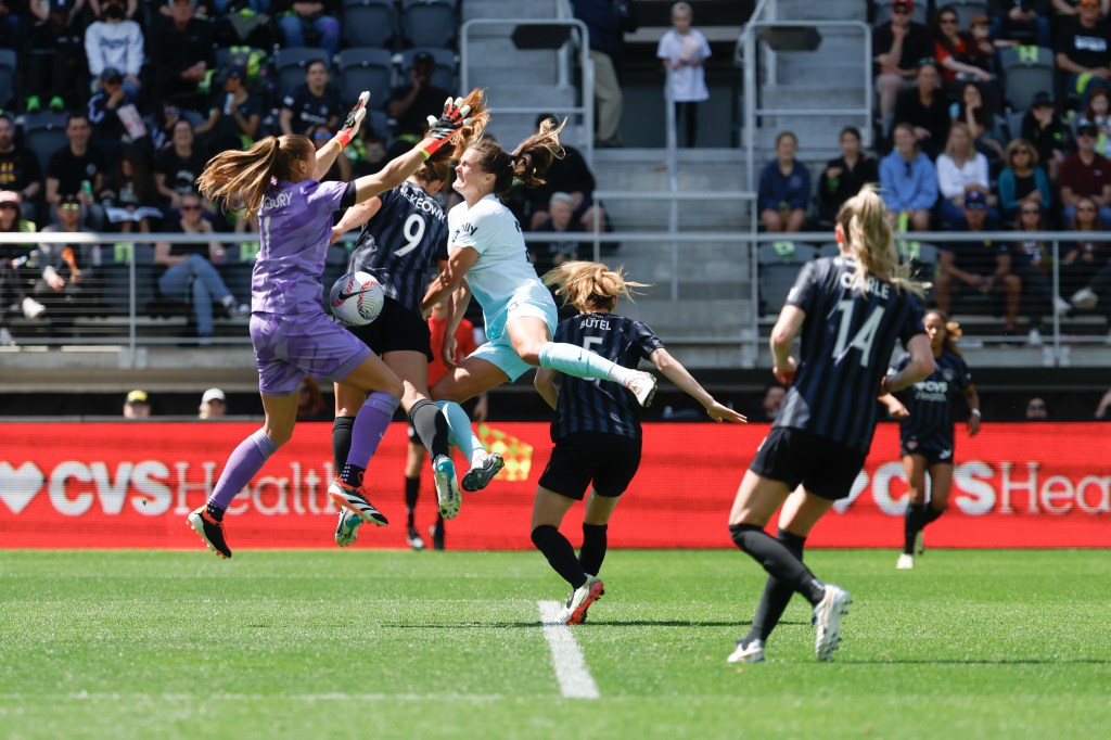 Gotham FC forward Katie Stengel (right) collides with Washington Spirit goalie Aubrey Kingsbury during its 2-0 loss.