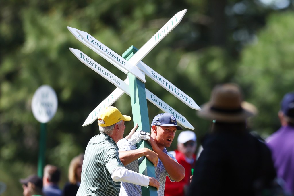 Bryson DeChambeau was told to put back the sign. 