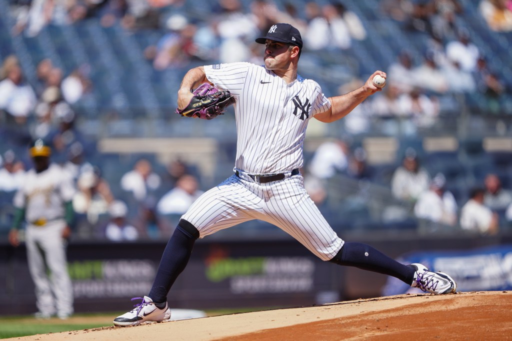 Carlos Rodon (55) delivers against the Oakland Athletics during the first inning at Yankee Stadium.