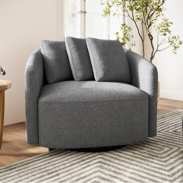 A charcoal swivel chair