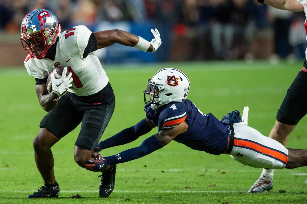 Western Kentucky Hilltoppers wide receiver Malachi Corley (11) turns up field after making a catch as Auburn Tigers take on Western Kentucky Hilltoppers at Jordan-Hare Stadium in Auburn, Ala., on Saturday, Nov. 19, 2022. 