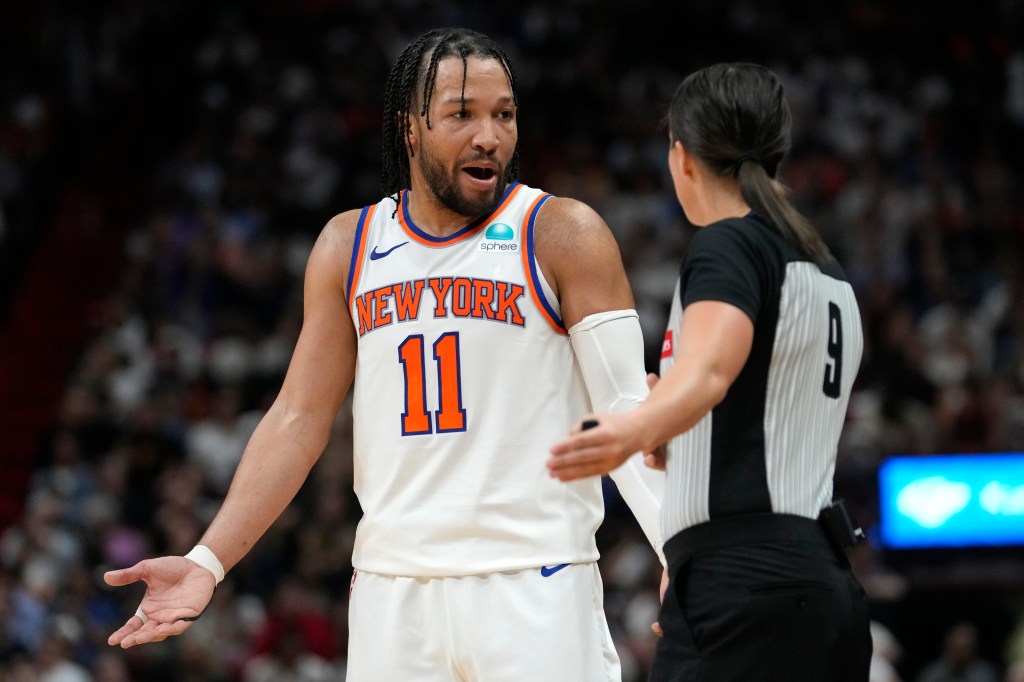 Jalen Brunson argues with referee Natalie Sago during the Knicks' 109-99 loss to the Heat.