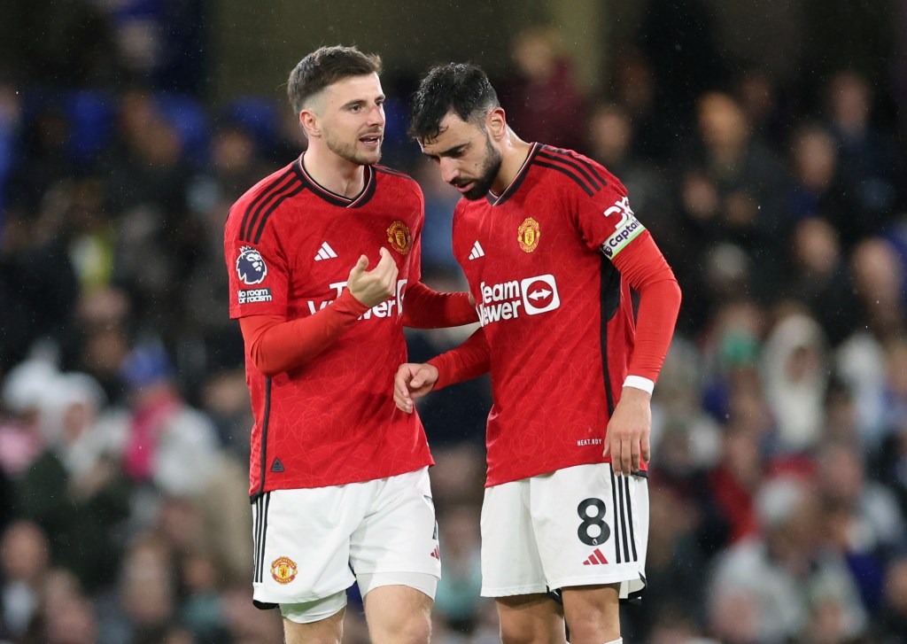 Mason Mount of Manchester United talks to Bruno Fernandes of Manchester United during the Premier League match between Chelsea FC and Manchester United.