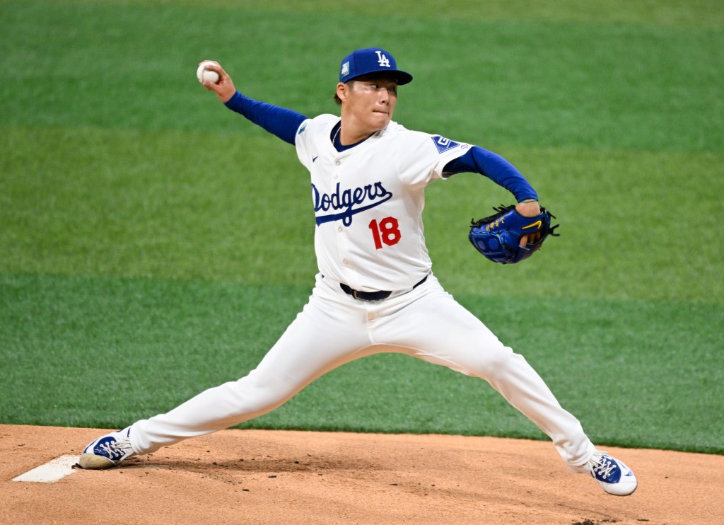 Yoshinobu Yamamoto #18 of Los Angeles Dodgers pitches in the top of the first inning during the 2024 Seoul Series game between Los Angeles Dodgers and San Diego Padres.