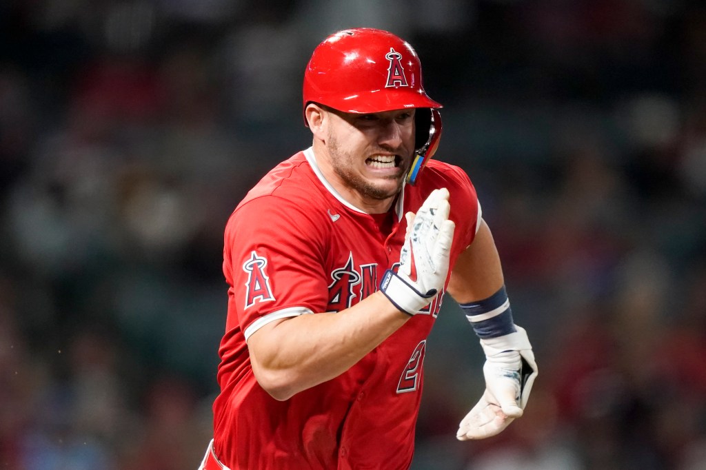 Los Angeles Angels' Mike Trout runs after a single during the seventh inning of a baseball game against the Philadelphia Phillies, Monday, April 29, 2024, in Anaheim, Calif.