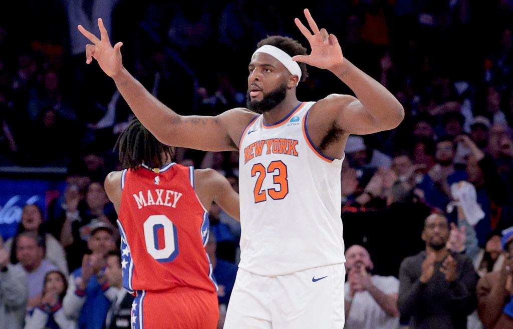 Mitchell Robinson, who scored eight points and grabbed 12 rebounds, celebrates during the Knicks' 111-104 Game 1 win over the 76ers.