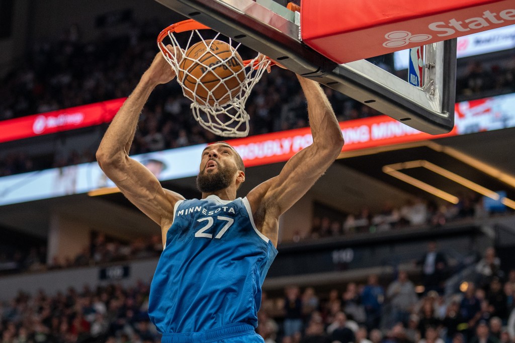 Minnesota Timberwolves center Rudy Gobert (27) dunks on the Washington Wizards in the third quarter at Target Center.