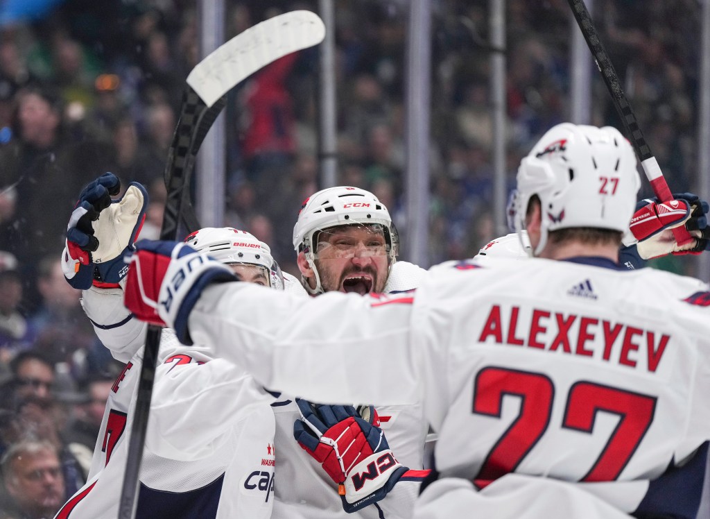 Alexander Ovechkin (c) leads the Capitals against the Rangers.