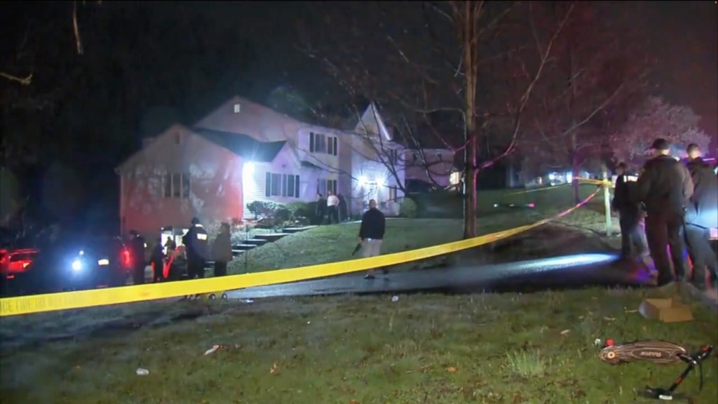 Police are seen responding to the home in New City, New York.