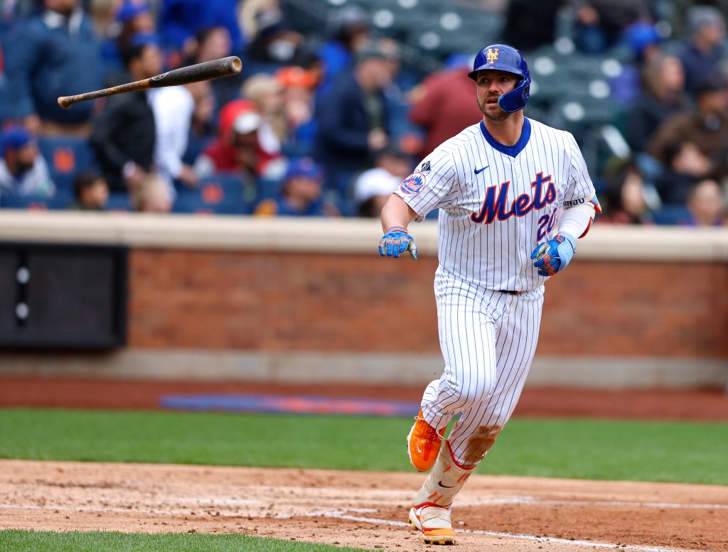 New York Mets first baseman Pete Alonso (20) tosses his bat after hitting a home run against the Kansas City Royals during the third inning 