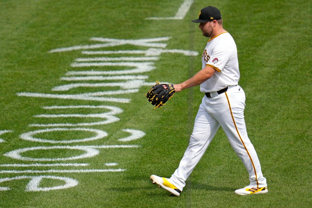 Pittsburgh Pirates relief pitcher David Bednar walks to the dugout after being pulled from the team's baseball game against the Detroit Tigers in the ninth inning in Pittsburgh, Tuesday, April 9, 2024.