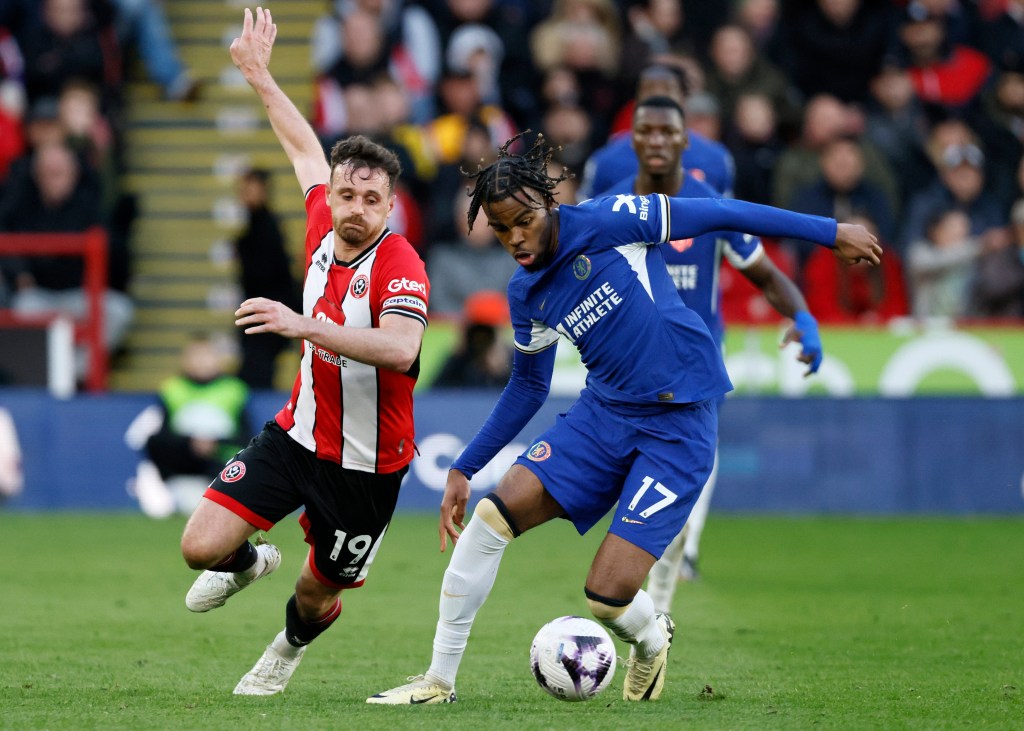 Carney Chukwuemeka of Chelsea challenges for possession. 