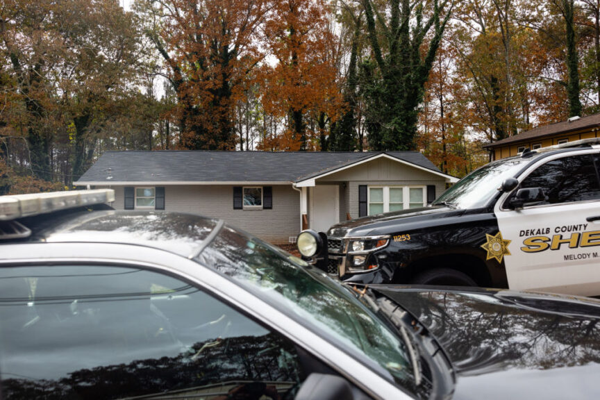 Police pass by a home occupied by squatters in Atlanta, Georgia, US, on Friday, Nov. 17, 2023. An estimated 1,200 homes are illegally occupied in the Atlanta metro area, an epicenter for institutional investors. Photographer: Elijah Nouvelage/Bloomberg via Getty Images