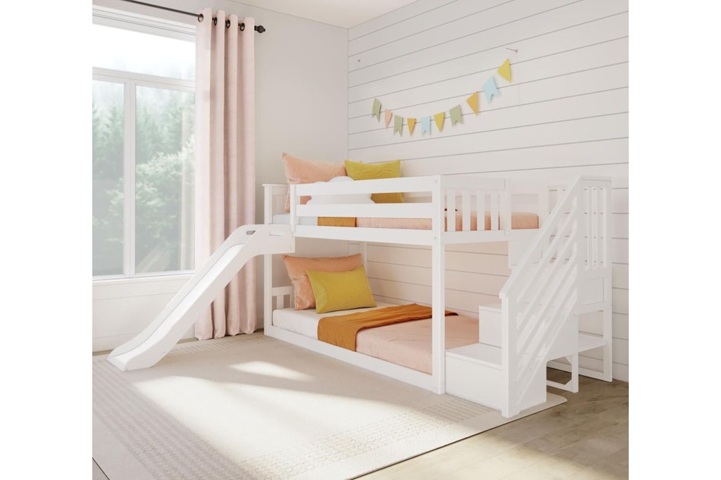 A bunk bed with a slide in a room