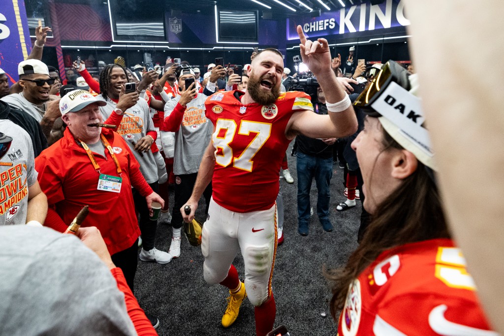  Travis Kelce #87 of the Kansas City Chiefs celebrates in the locker room after winning Super Bowl LVIII against the San Francisco 49ers at Allegiant Stadium on Sunday, February 11, 2024 in Las Vegas, Nevada. (Photo by Lauren Leigh Bacho/Getty Images)