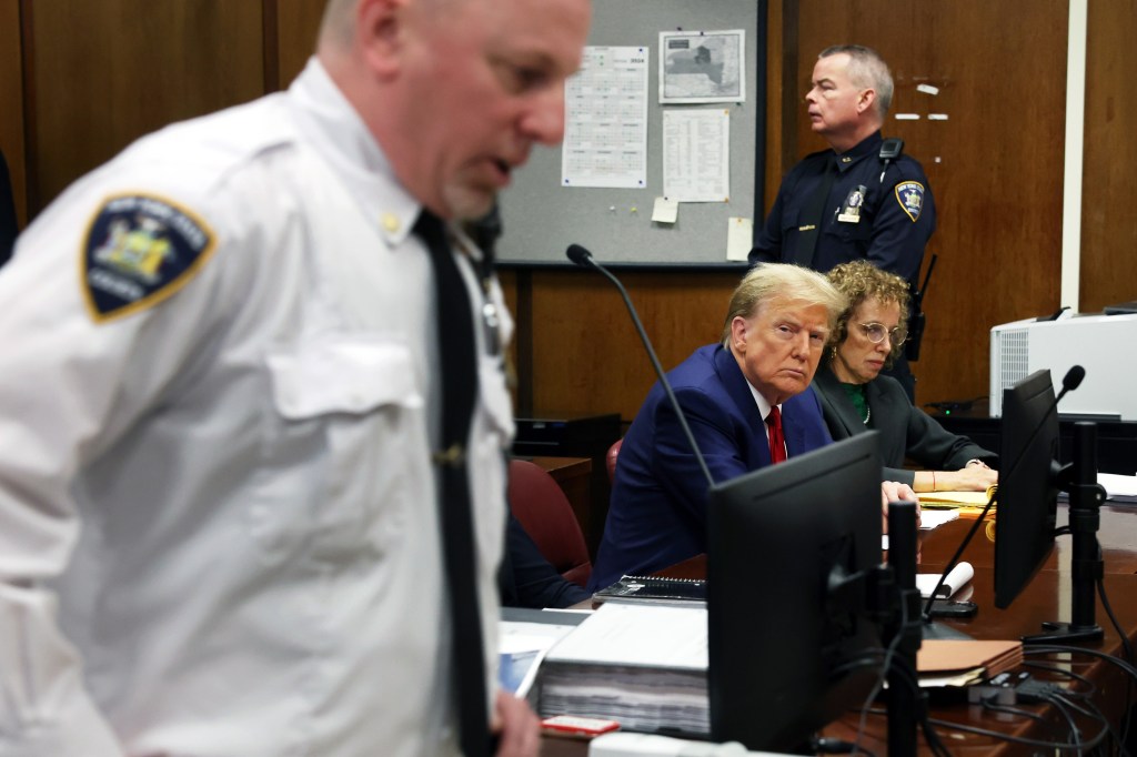 Former U.S. President Donald Trump appears with his lawyer Susan Necheles for a pre-trial hearing in a hush money case in criminal court on March 25, 2024 in New York City.