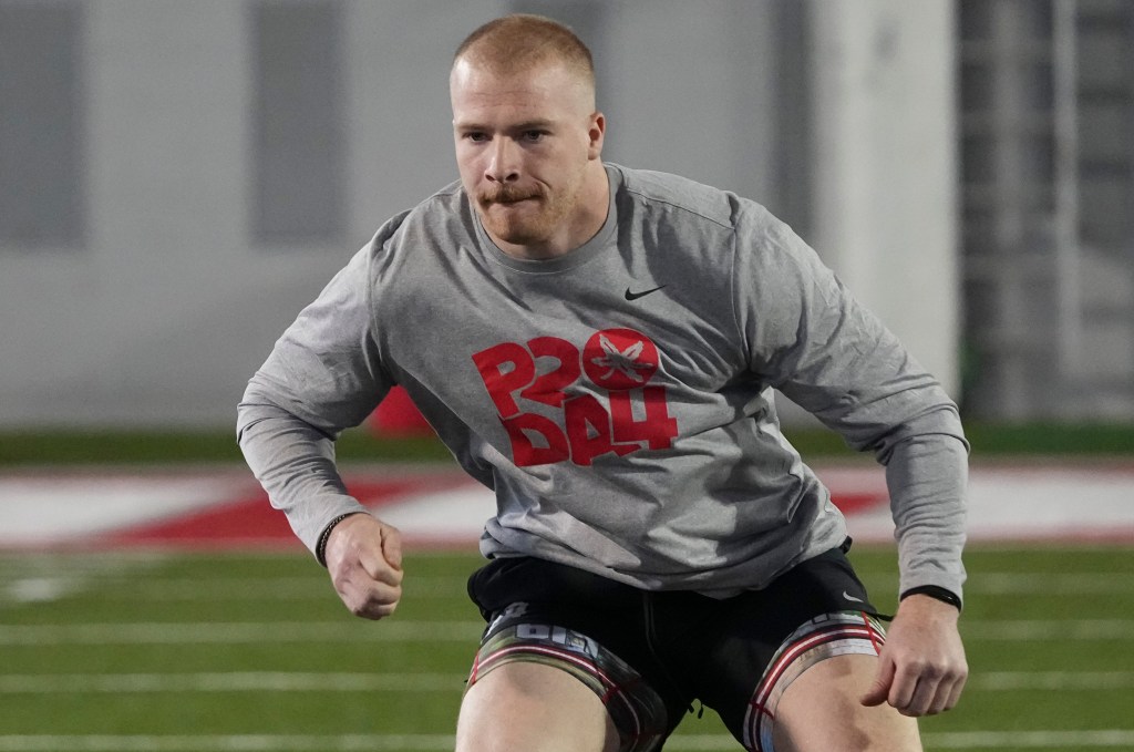 Ohio State linebacker Tommy Eichenberg works out during the NFL scouting combine.