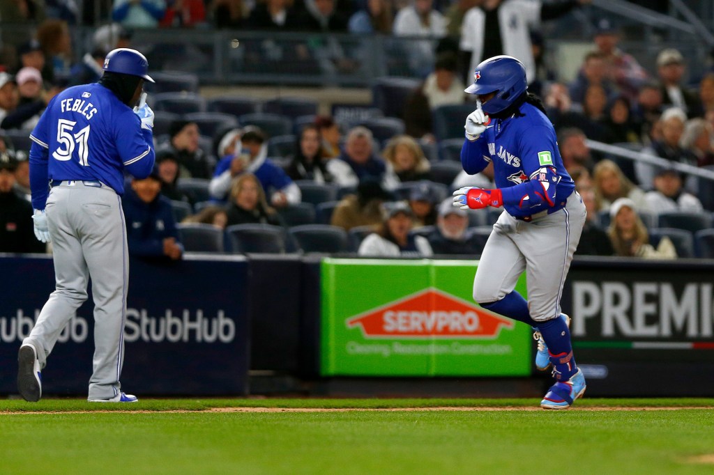 Vladimir Guerrero Jr. shushed the Yankee Stadium crowd as he rounded third base on Saturday.