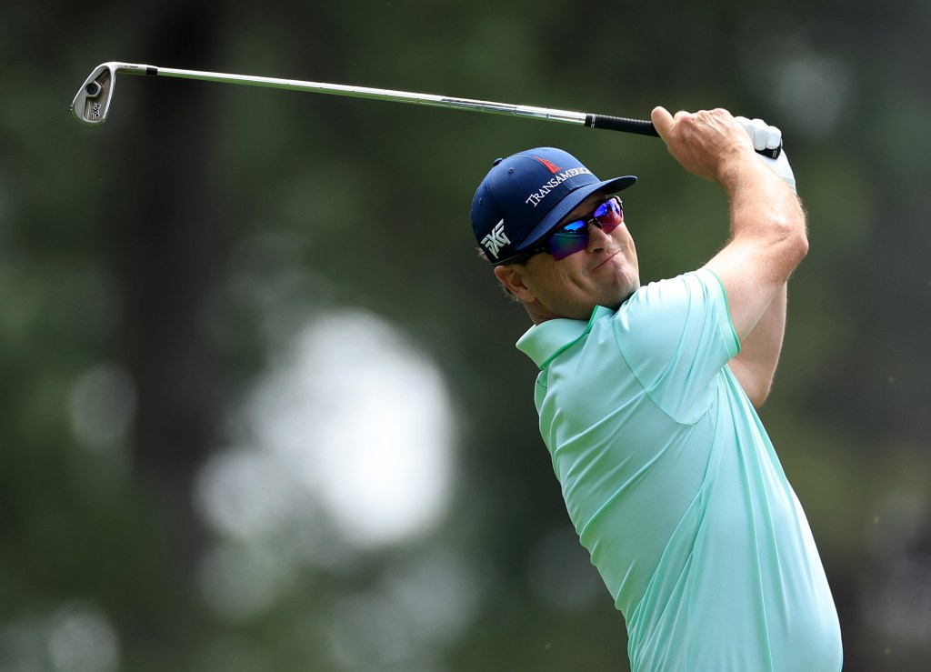 Zach Johnson plays his tee shot on the fourth hole during the first round of the 2024 Masters Tournament.