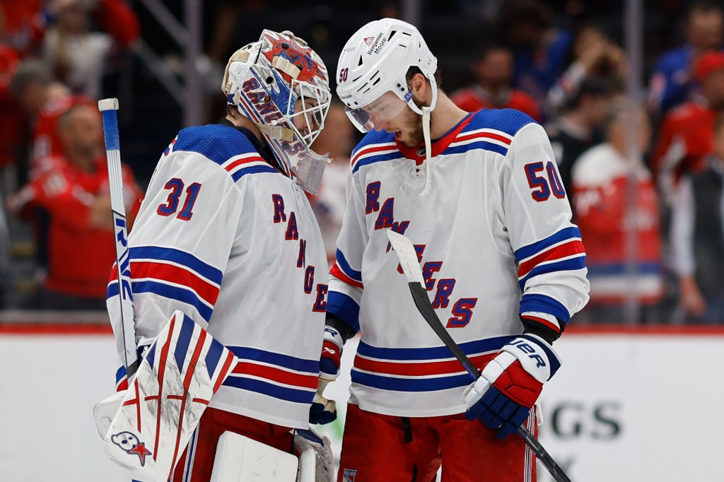 Igor Shesterkin (left) celebrates with Will Cuylle after the Rangers' series-clinching win over the Capitals.