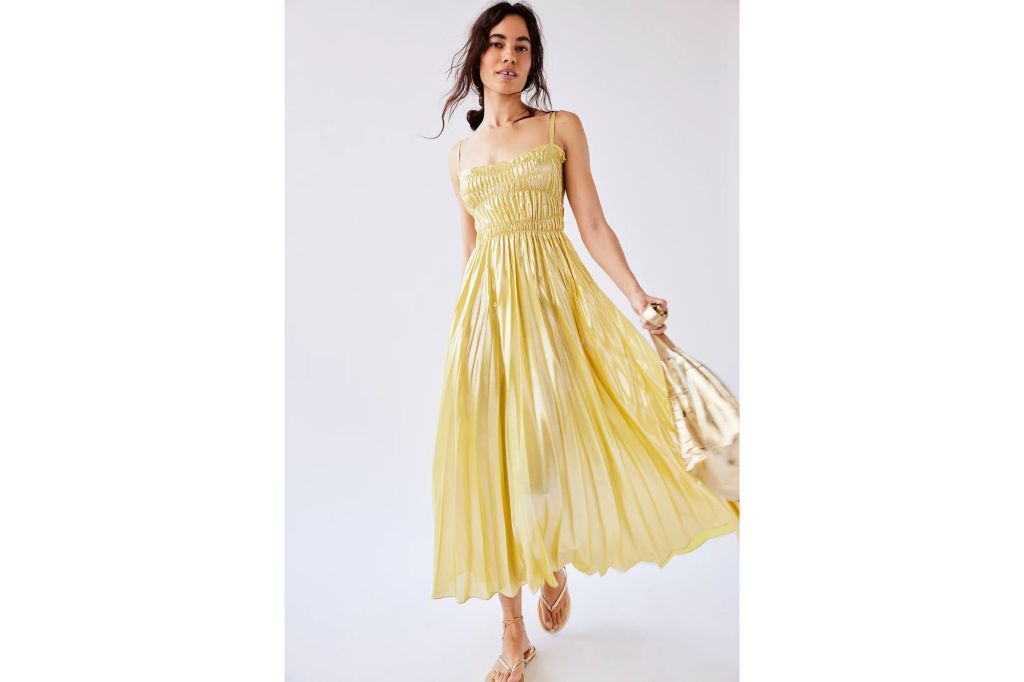 A woman in a yellow sundress