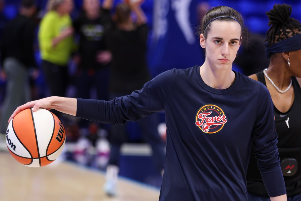 Caitlin Clark #22 of the Indiana Fever warms up prior to the preseason game against the Dallas Wings at College Park Center on May 03, 2024 in Arlington, Texas. 