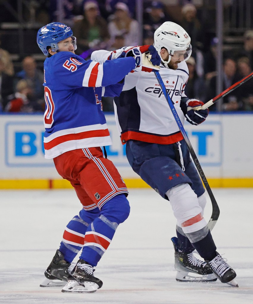 Will Cuylle hits Tom Wilson during the Rangers' Game 2 win over the Capitals on April 23, 2024. 