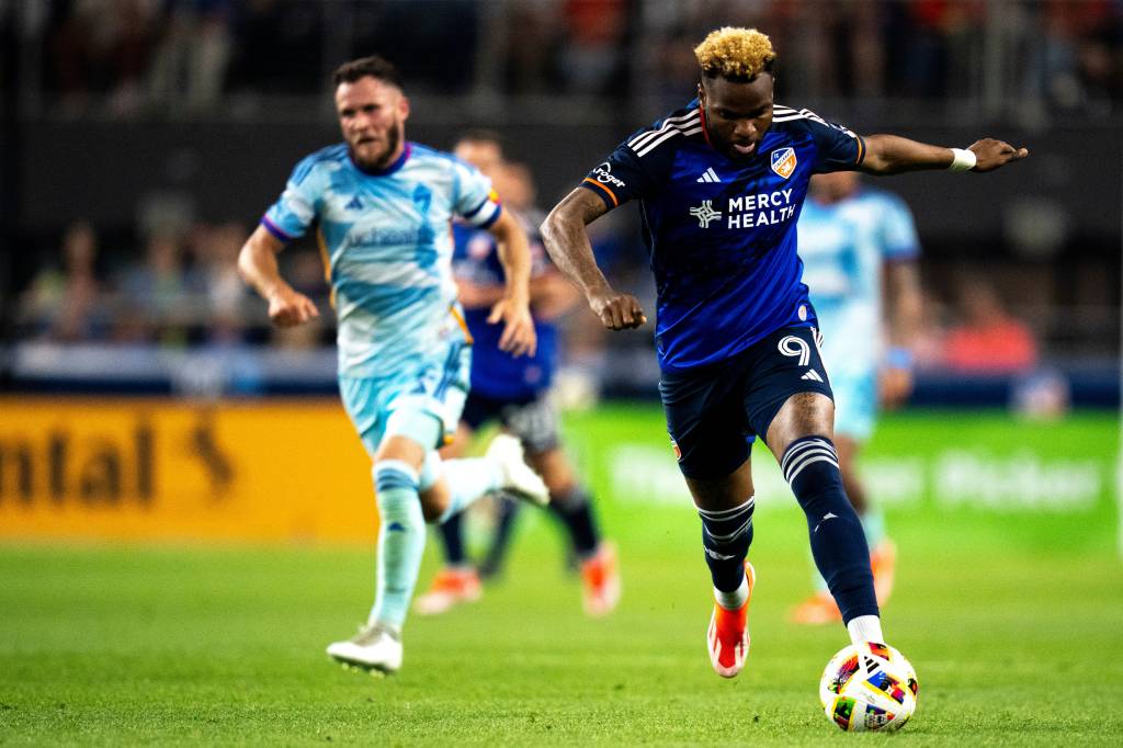 FC Cincinnati forward Aaron Boupendza (9) takes the ball up the pitch in the second half of the MLS match between the FC Cincinnati and the Colorado Rapids at TQL Stadium in Cincinnati on Saturday, April 27, 2024.
