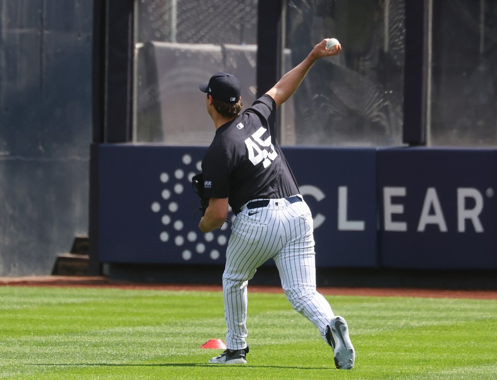 Gerrit Cole throws in the outfield prior to pitching off the mound on May 4, 2024. 