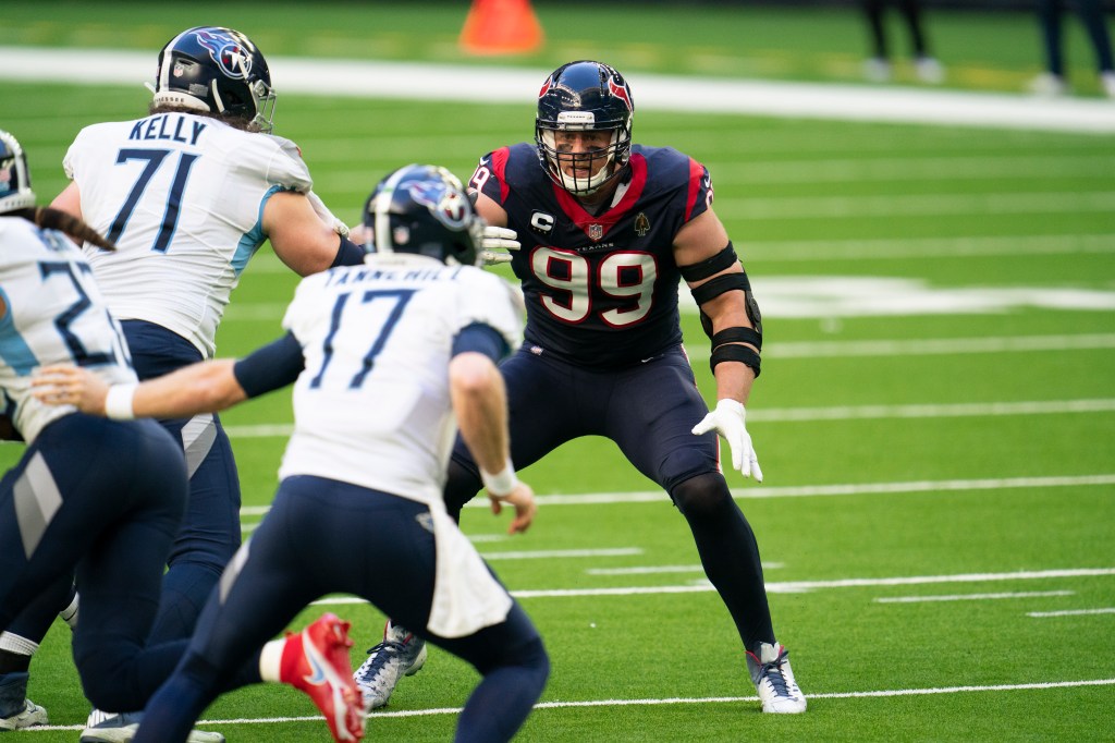 J.J. Watt #99 of the Houston Texans plays the field during an NFL game against the Tennessee Titans.