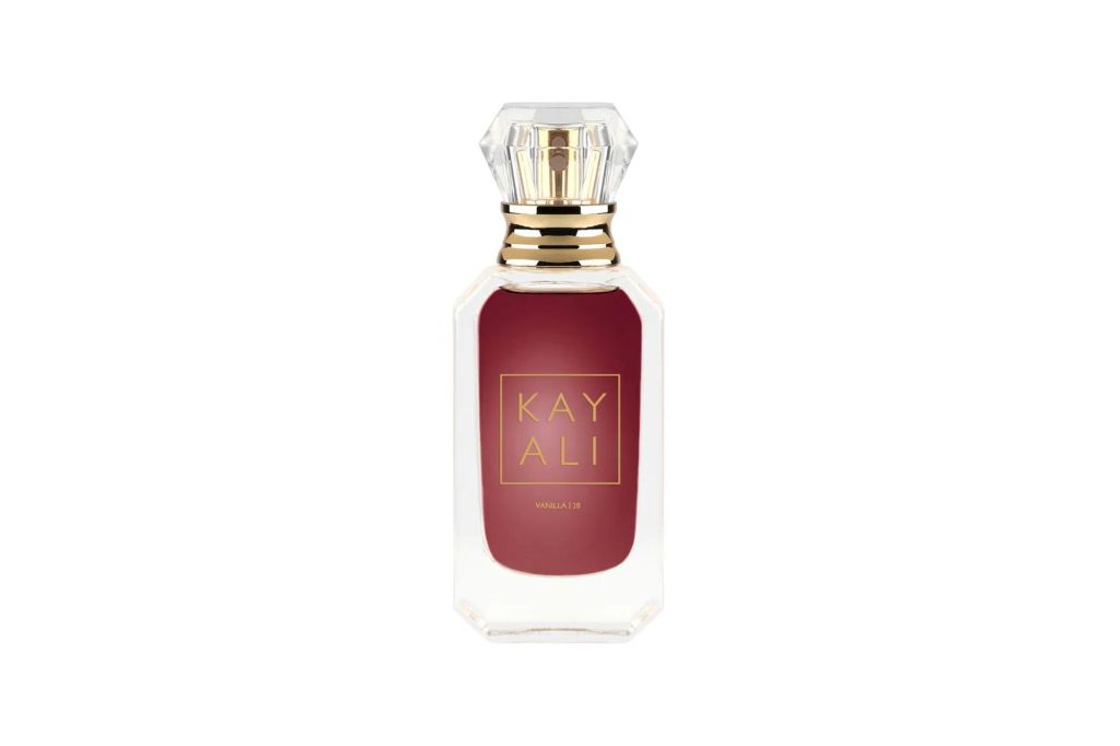 bottle of perfume with a clear and gold cap.