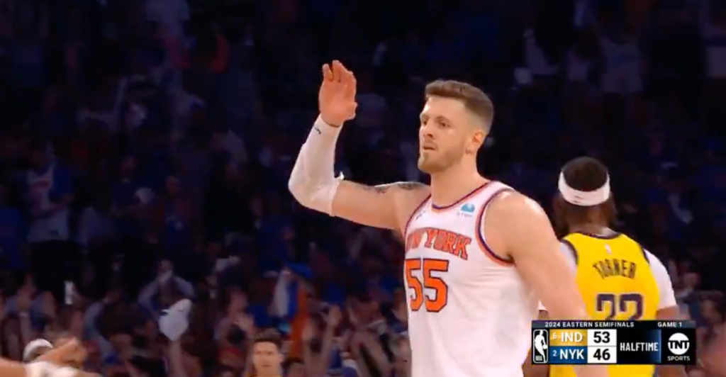 Isaiah Hartenstein celebrates after hitting a half-court shot at the buzzer before halftime of Game 1 between the Knicks and Pacers.