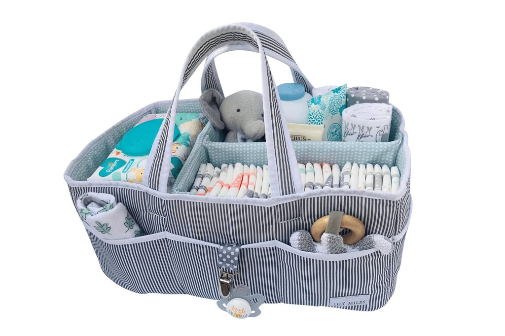 A diaper bag with a stuffed animal inside