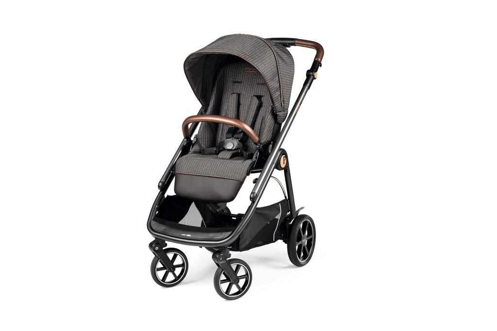 A baby stroller with a grey cover