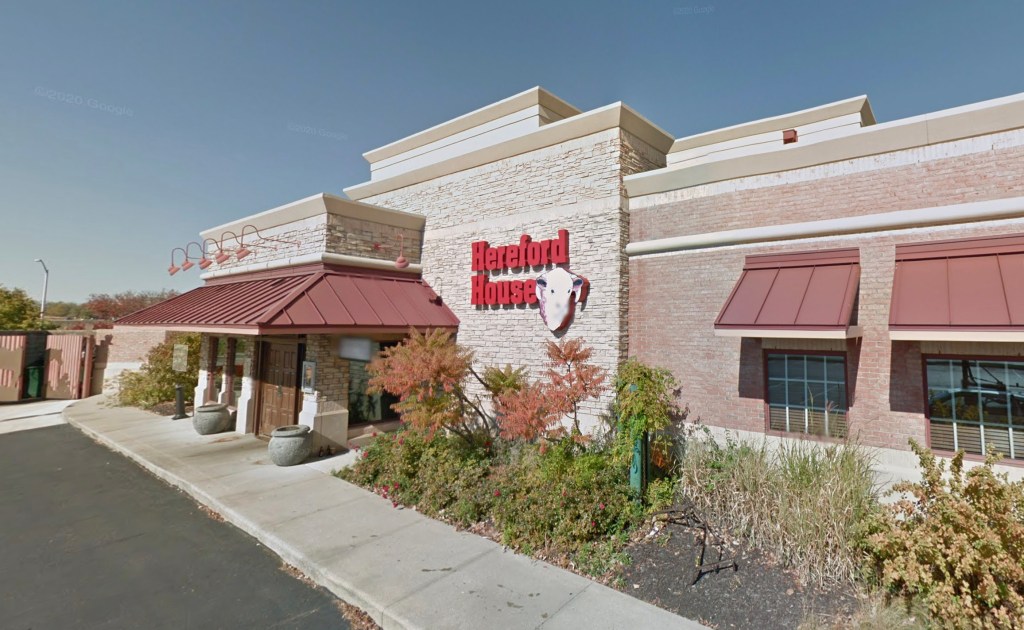 Light-colored brick building exterior, a restaurant called Hereford House.