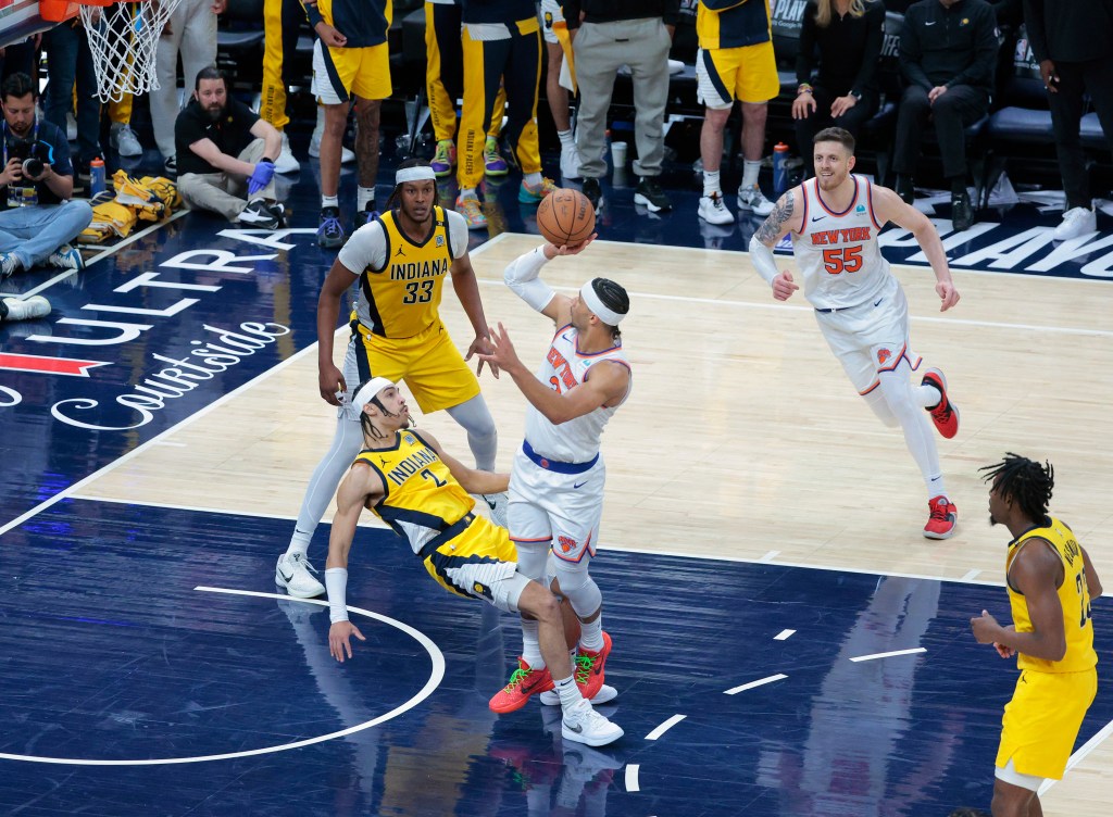 Josh Hart puts up a shot over Andrew Nembhard #2 of the Indiana Pacers during the fourth quarter.