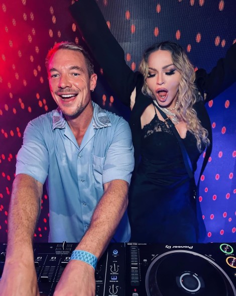 'HEY, MR. DJ': During a “Celebration” tour stop in Rio de Janeiro, Madonna boogies down with opening act Diplo.