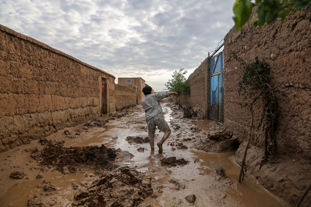 A man surveying the damage to houses after severe flash floods in Shahrak Muhajireen village, Baghlan, Afghanistan on May 12, 2024