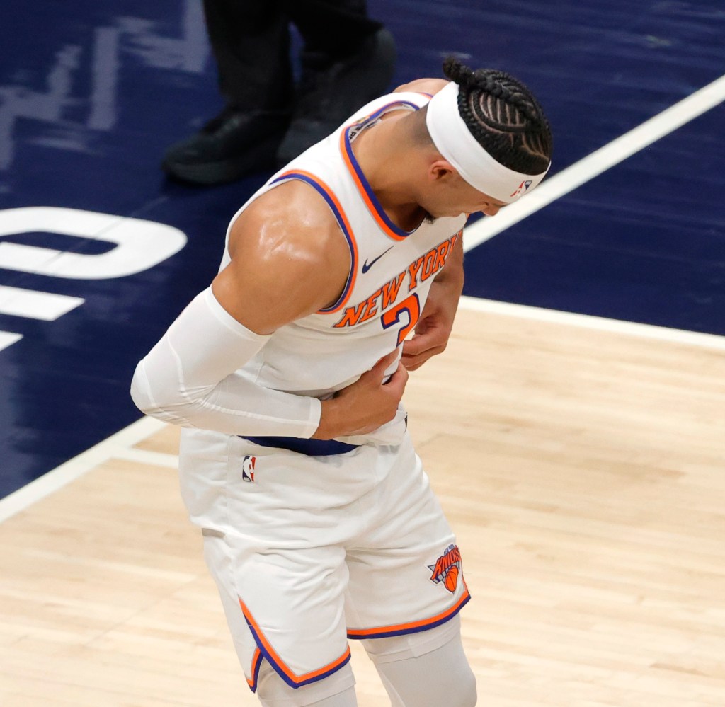 Josh Hart #3 of the New York Knicks reacts after getting hit in the ribs.