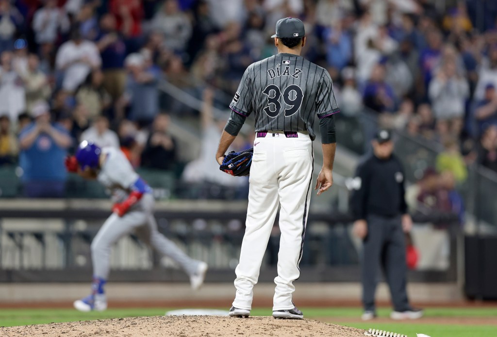 Edwin Diaz #39 of the New York Mets looks on from the mound after surrendering a ninth inning two run home run against Christopher Morel #5 of the Chicago Cubs at Citi Field on April 29, 2024