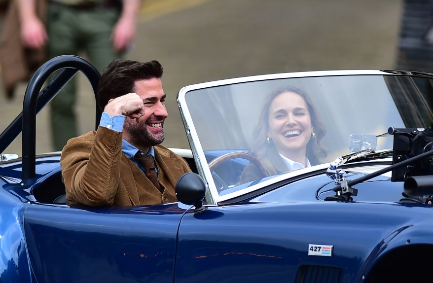 JOYRIDERS: In Liverpool, England, filming “A Fountain of Youth,” John Krasinski and Natalie Portman make each other laugh.