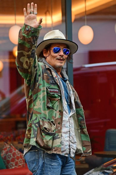 TREASURE SIGHTED: Out and about in central London, Johnny Depp takes style notes from his character Captain Jack Sparrow.