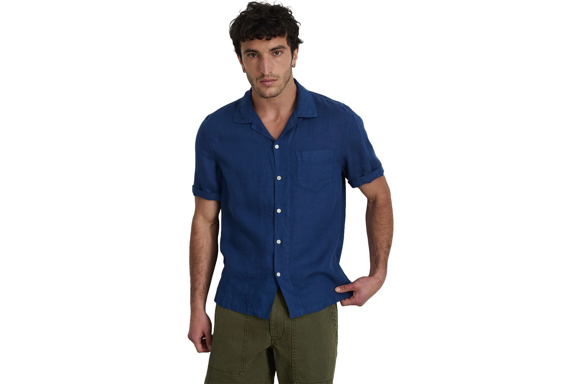 A model in a blue linen shirt