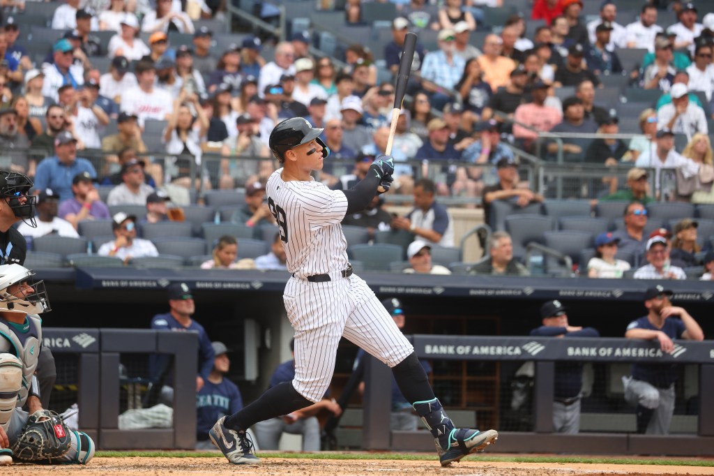 Aaron Judge #99 of the New York Yankees hits a solo home run during the third inning when the New York Yankees played the Seattle Mariners Thursday, May 23, 2024 at Yankee Stadium in the Bronx, NY.