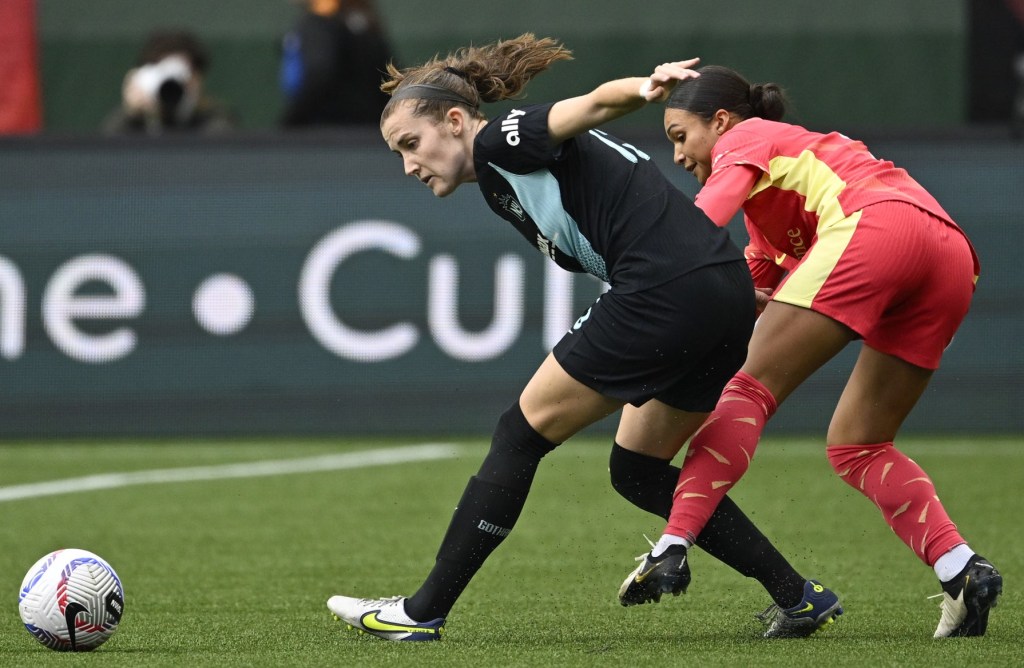 Gotham FC defender Tierna Davidson battles Portland Thorns FC forward Sophia Smith for the ball during a game earlier this season.