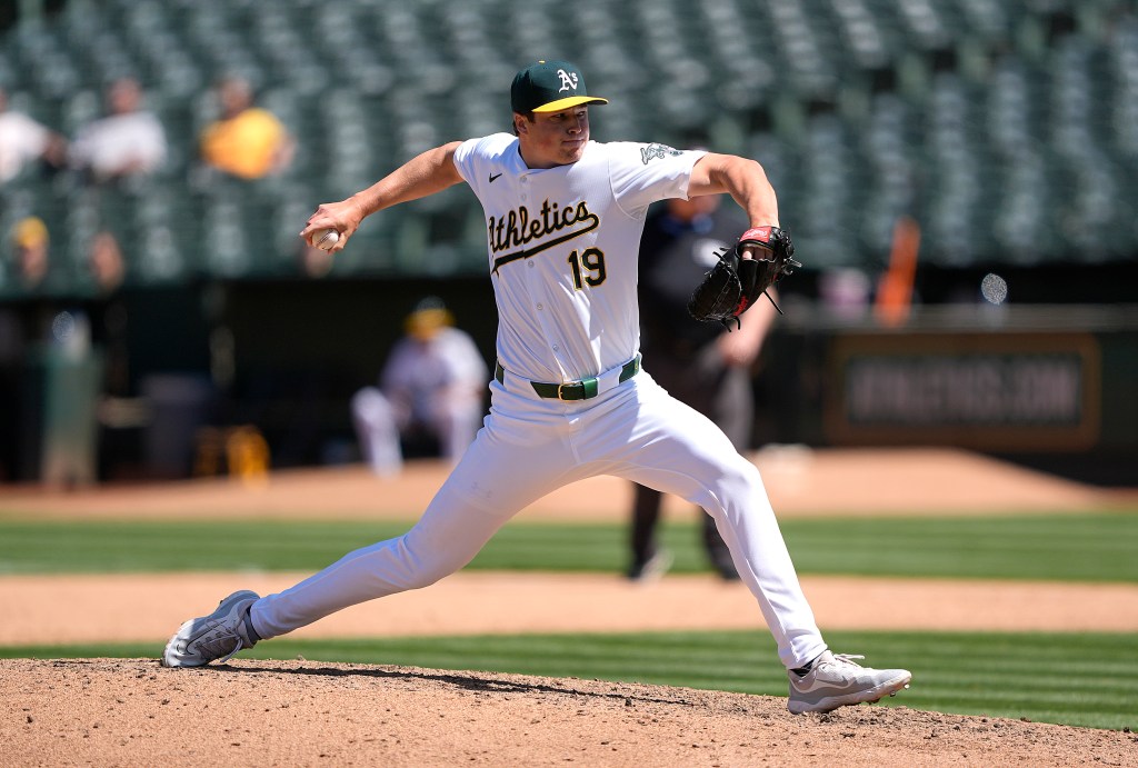 Mason Miller #19 of the Oakland Athletics pitches against the Pittsburgh Pirates in the top of the ninth inning on May 1, 2024 at the Oakland Coliseum in Oakland, California.