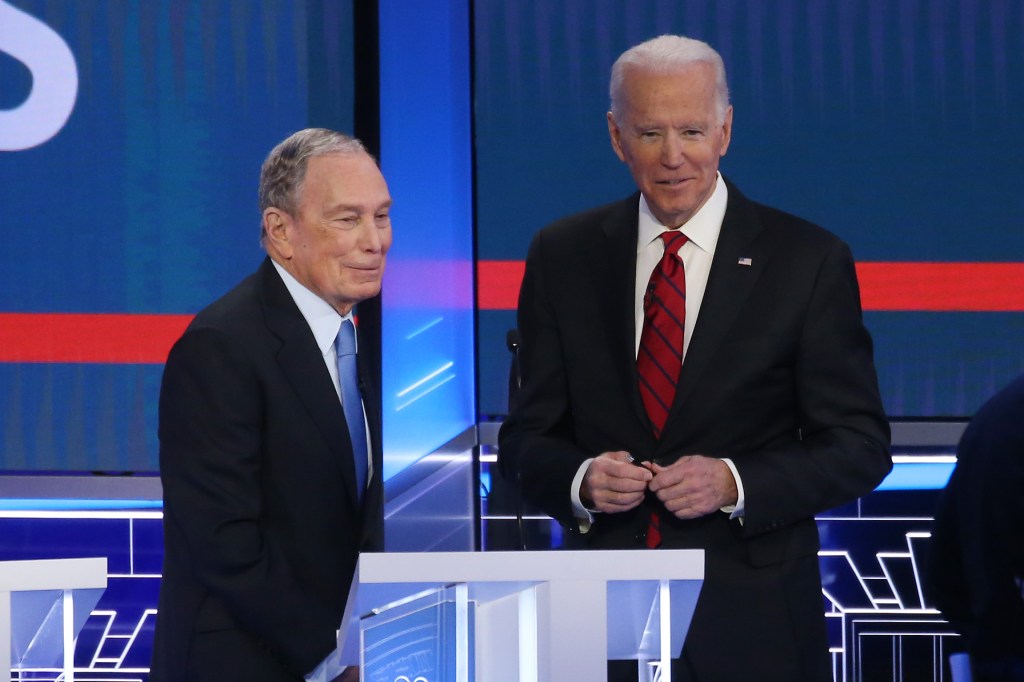 Democratic presidential candidates former New York City mayor Mike Bloomberg (L)  and former Vice President Joe Biden speak during a break during the Democratic presidential primary debate at Paris Las Vegas on February 19, 2020 in Las Vegas, Nevada.