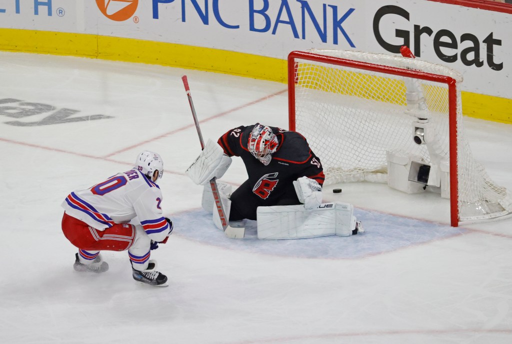 Chris Kreider scores a goal on Pyotr Kochetkov during the second period of the Rangers' Game 3 3-2 overtime win over the Hurricanes.