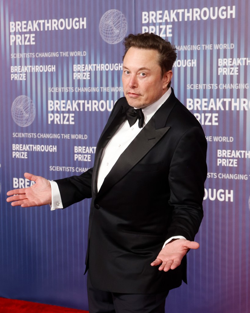 Elon Musk in a tuxedo at a red carpet event.